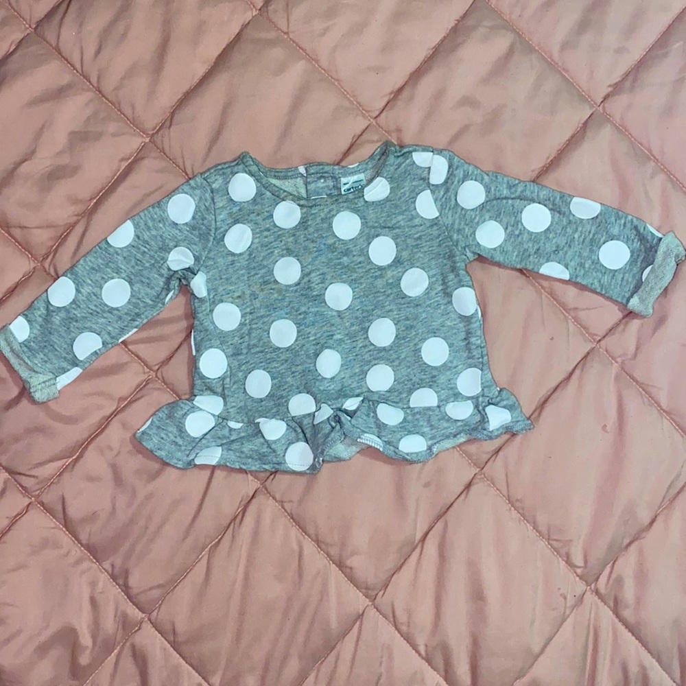Infant cotton top. Ruffled bottom detail. 9 months. Gently worn.